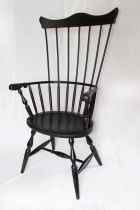 Comb back windsor chair with whale carvings